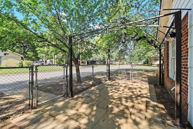 717 Thersa Dr, River Oaks, TX 76114 - view of patio with a gate