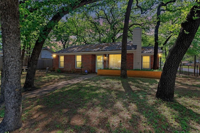 717 Thersa Dr, River Oaks, TX 76114 - view of front of property featuring brick siding and a chimney