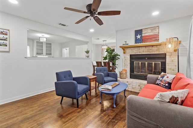 717 Thersa Dr, River Oaks, TX 76114 - living room featuring wood finished floors, recessed lighting, a ceiling fan, and a fireplace