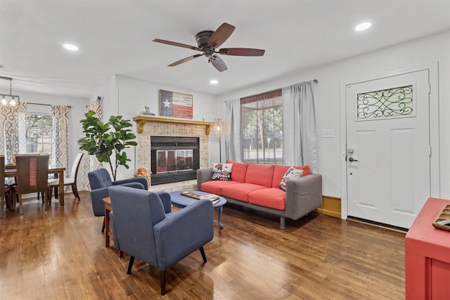 717 Thersa Dr, River Oaks, TX 76114 - living room featuring wood finished floors, a fireplace, a ceiling fan, and recessed lighting