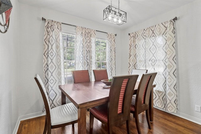 717 Thersa Dr, River Oaks, TX 76114 - dining room featuring wood finished floors and a chandelier