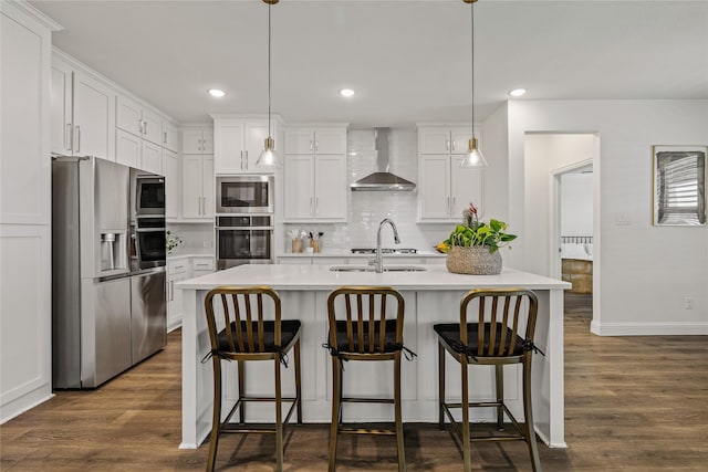 1430 Shaker Hills Rd, Gunter, TX 75058 - kitchen with appliances with stainless steel finishes, wall chimney exhaust hood, backsplash, light countertops, and white cabinetry
