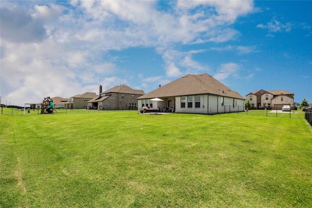 1430 Shaker Hills Rd, Gunter, TX 75058 - rear view of property featuring a fenced backyard, a playground, and a patio area
