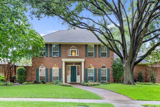5913 Kensington Dr, Plano, TX 75093 - colonial inspired home with brick siding
