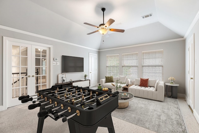 5913 Kensington Dr, Plano, TX 75093 - game room with french doors, lofted ceiling, ceiling fan, carpet flooring, and crown molding