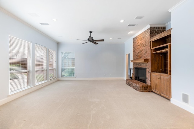 5913 Kensington Dr, Plano, TX 75093 - unfurnished living room featuring crown molding, light colored carpet, a fireplace, ceiling fan, and recessed lighting