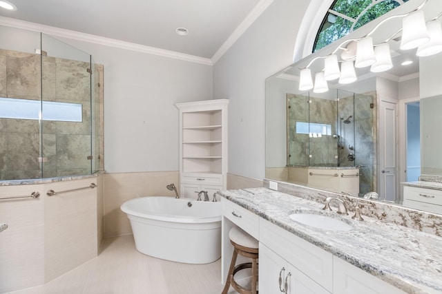 5913 Kensington Dr, Plano, TX 75093 - full bath featuring a shower stall, vanity, a soaking tub, and ornamental molding