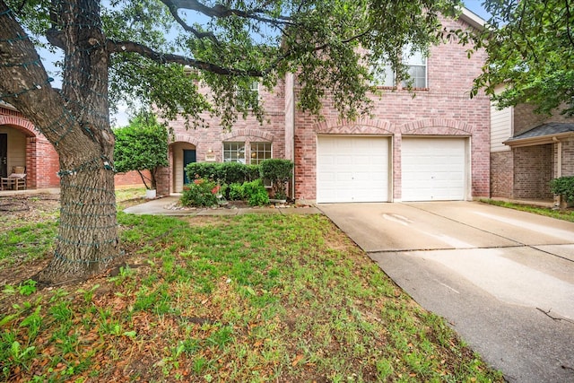 3701 Lazy River Ranch Rd, Fort Worth, TX 76262 - view of front of home with an attached garage, driveway, and brick siding
