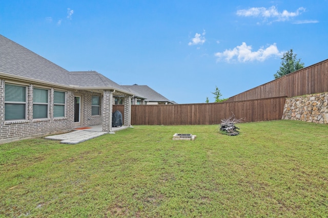 5524 Santa Elena Ct, Fort Worth, TX 76126 - fenced backyard with a patio area and an outdoor fire pit
