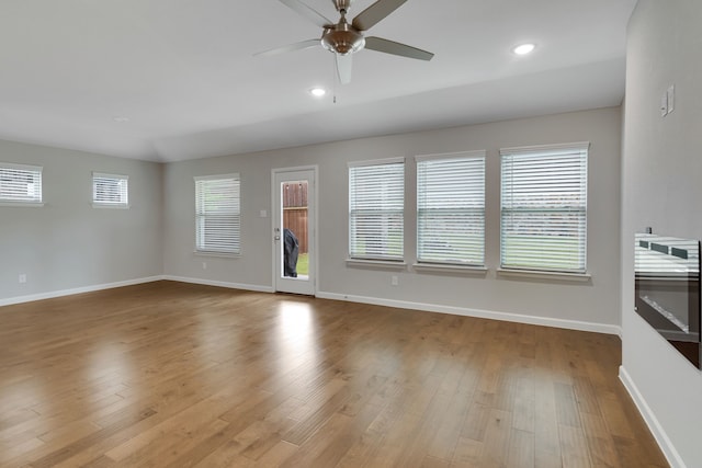 5524 Santa Elena Ct, Fort Worth, TX 76126 - unfurnished living room with ceiling fan, wood finished floors, and recessed lighting