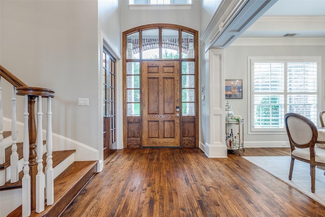 4637 Biltmoore Dr, Frisco, TX 75034 - entrance foyer featuring stairs, dark wood finished floors, and crown molding