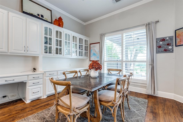 4637 Biltmoore Dr, Frisco, TX 75034 - dining room with crown molding and dark wood-style floors
