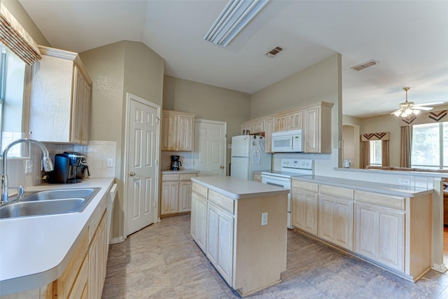 6905 Laurel Canyon Ter, Fort Worth, TX 76132 - kitchen with white appliances, light brown cabinetry, light countertops, a center island, and a ceiling fan