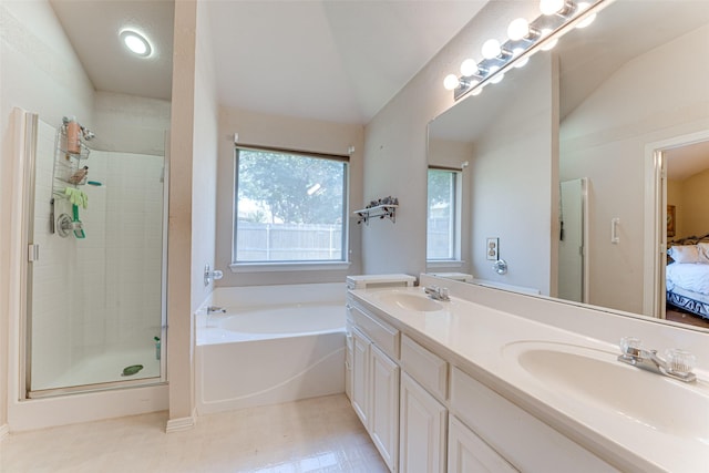 6905 Laurel Canyon Ter, Fort Worth, TX 76132 - bathroom featuring ensuite bathroom, a shower stall, a bath, double vanity, and vaulted ceiling