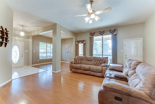 6905 Laurel Canyon Ter, Fort Worth, TX 76132 - living area with healthy amount of natural light, a ceiling fan, and light wood-type flooring
