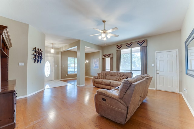 6905 Laurel Canyon Ter, Fort Worth, TX 76132 - living room with ceiling fan and light wood-style flooring