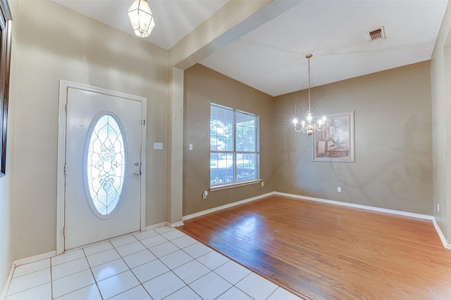 6905 Laurel Canyon Ter, Fort Worth, TX 76132 - entrance foyer with wood finished floors and a chandelier
