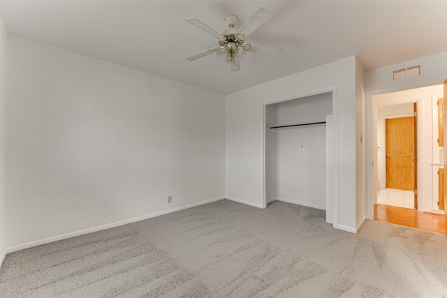 410 Ovilla Rd, Waxahachie, TX 75167 - unfurnished bedroom with carpet flooring, a closet, and a ceiling fan