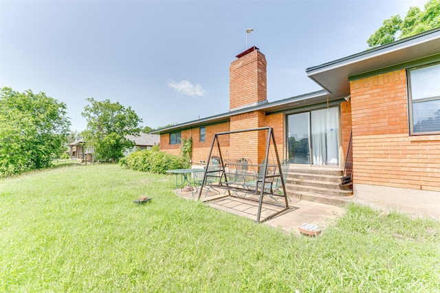 410 Ovilla Rd, Waxahachie, TX 75167 - view of green lawn featuring entry steps and a patio area