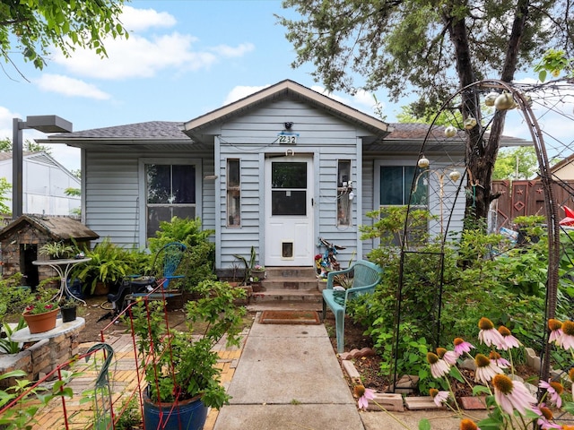 2232 E Kiest Blvd, Dallas, TX 75216 - bungalow-style home featuring entry steps and roof with shingles