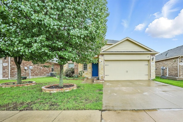 1209 Jasper Xing, Princeton, TX 75407 - view of front facade featuring an attached garage, driveway, a front lawn, and brick siding