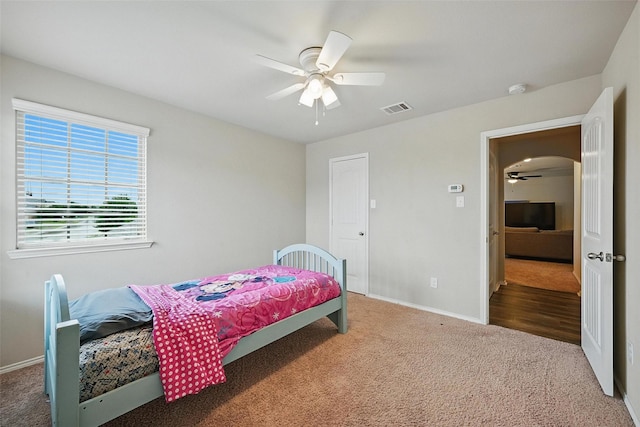 1209 Jasper Xing, Princeton, TX 75407 - carpeted bedroom with a ceiling fan and arched walkways