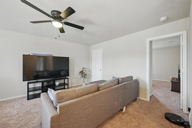 1209 Jasper Xing, Princeton, TX 75407 - carpeted living area featuring a ceiling fan and baseboards