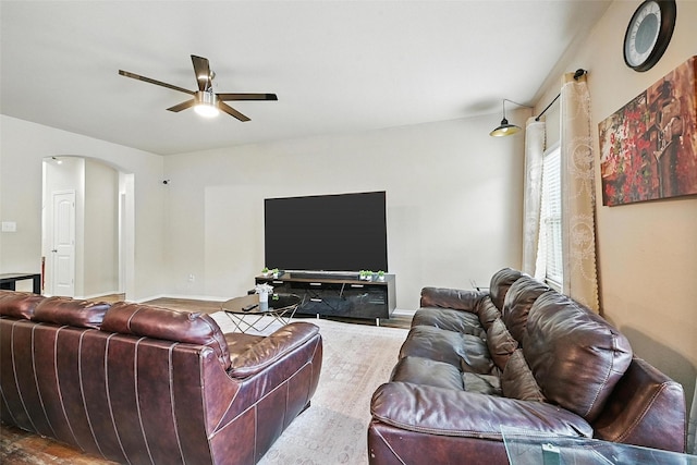 1209 Jasper Xing, Princeton, TX 75407 - living area with a ceiling fan and arched walkways