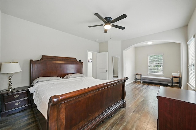 1209 Jasper Xing, Princeton, TX 75407 - bedroom featuring arched walkways, dark wood-style flooring, and ceiling fan