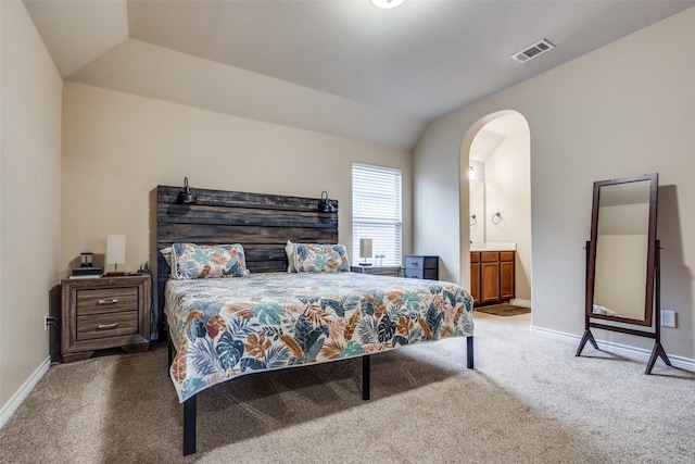 3820 Buchanan St, Mckinney, TX 75071 - bedroom featuring carpet flooring, lofted ceiling, arched walkways, and ensuite bath