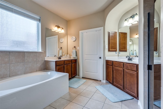 3820 Buchanan St, Mckinney, TX 75071 - bathroom with tile patterned floors, a bath, and two vanities