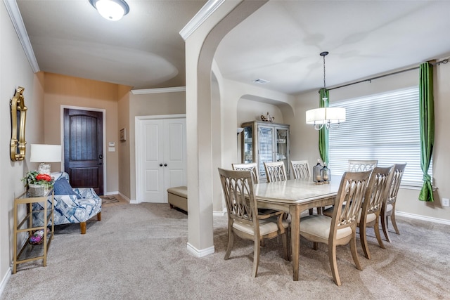 3820 Buchanan St, Mckinney, TX 75071 - carpeted dining room featuring arched walkways, a chandelier, and crown molding