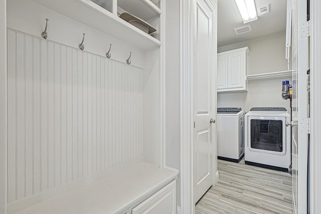 1701 Trinidad Way, Argyle, TX 76226 - mudroom with separate washer and dryer and light wood-style floors