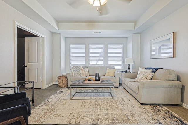 1701 Trinidad Way, Argyle, TX 76226 - carpeted living area with a ceiling fan and a tray ceiling