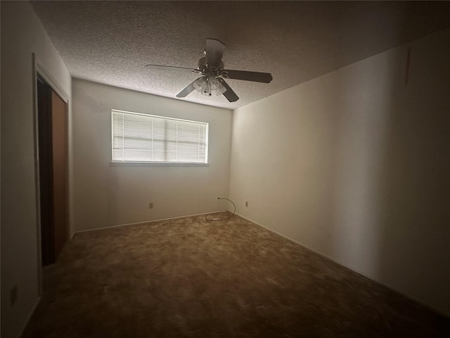 1916 11th St, Mineral Wells, TX 76067 - unfurnished bedroom with carpet floors, a textured ceiling, a ceiling fan, and a closet