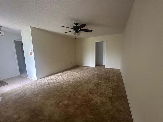 1916 11th St, Mineral Wells, TX 76067 - carpeted empty room with ceiling fan and a textured ceiling