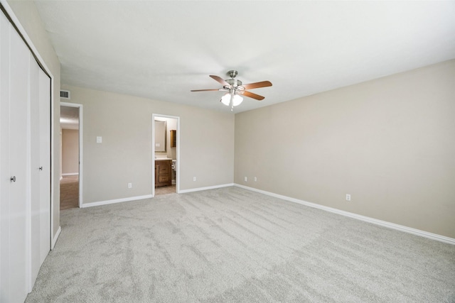 5109 Bartlett Dr, The Colony, TX 75056 - unfurnished bedroom featuring light colored carpet, a closet, ensuite bathroom, and ceiling fan