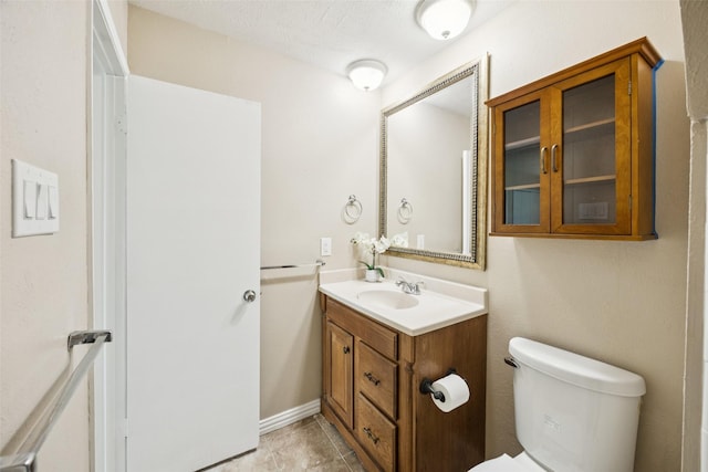 5109 Bartlett Dr, The Colony, TX 75056 - half bath featuring vanity and tile patterned flooring