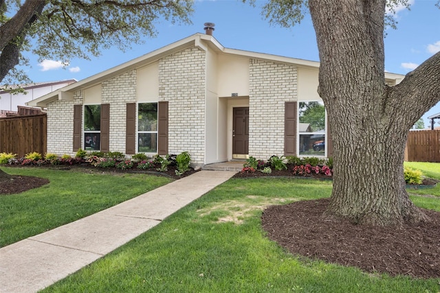 5109 Bartlett Dr, The Colony, TX 75056 - mid-century home with brick siding
