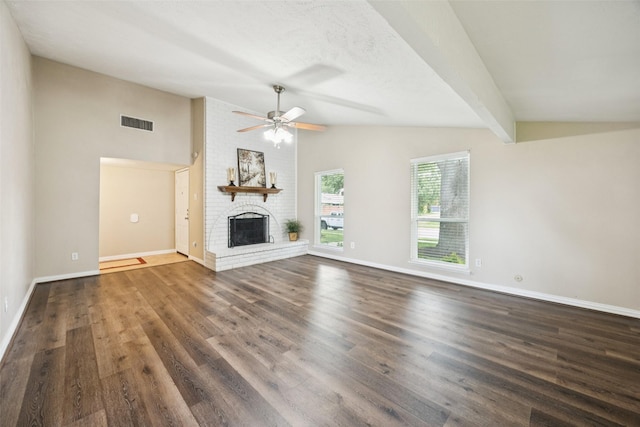 5109 Bartlett Dr, The Colony, TX 75056 - unfurnished living room with ceiling fan, a fireplace, and wood finished floors