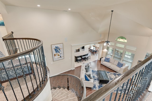 1220 Glendon Dr, Forney, TX 75126 - stairway with high vaulted ceiling, ceiling fan, and recessed lighting