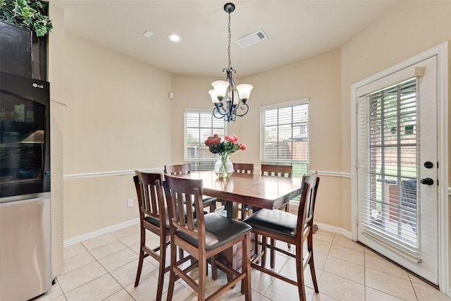 1220 Glendon Dr, Forney, TX 75126 - dining area featuring light tile patterned floors, a chandelier, and recessed lighting