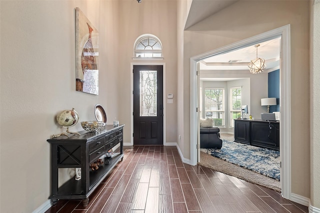 1220 Glendon Dr, Forney, TX 75126 - foyer entrance with wood finish floors and a chandelier