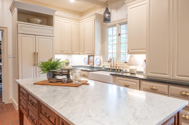 5906 Tiffany Ct, Arlington, TX 76016 - kitchen with light stone countertops, hanging light fixtures, a kitchen island, brick patterned flooring, and open shelves
