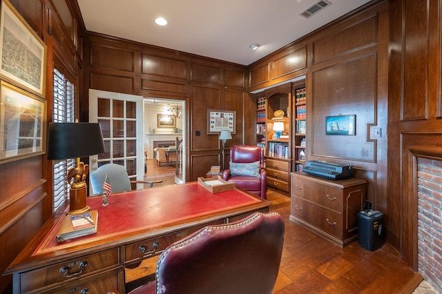 5906 Tiffany Ct, Arlington, TX 76016 - office area with a decorative wall, a fireplace, built in shelves, wood walls, and recessed lighting