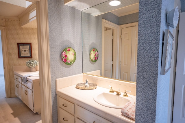 5906 Tiffany Ct, Arlington, TX 76016 - bathroom featuring wallpapered walls and vanity