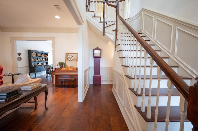 5906 Tiffany Ct, Arlington, TX 76016 - stairway featuring a decorative wall, ornamental molding, wood finished floors, a wainscoted wall, and recessed lighting