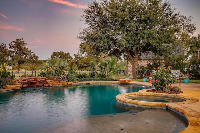 1204 E Scandinavian Ct, Granbury, TX 76048 - view of swimming pool with a pool with connected hot tub