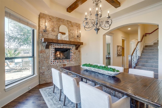 1204 E Scandinavian Ct, Granbury, TX 76048 - dining room with beam ceiling, a chandelier, wood finished floors, stairs, and arched walkways