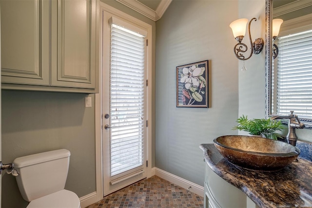 1204 E Scandinavian Ct, Granbury, TX 76048 - half bath featuring vanity and crown molding
